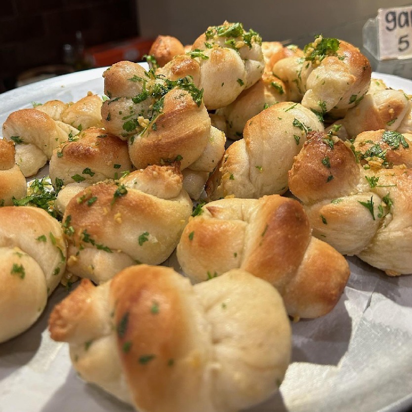 A tray of Mister P’s garlic knots for sharing